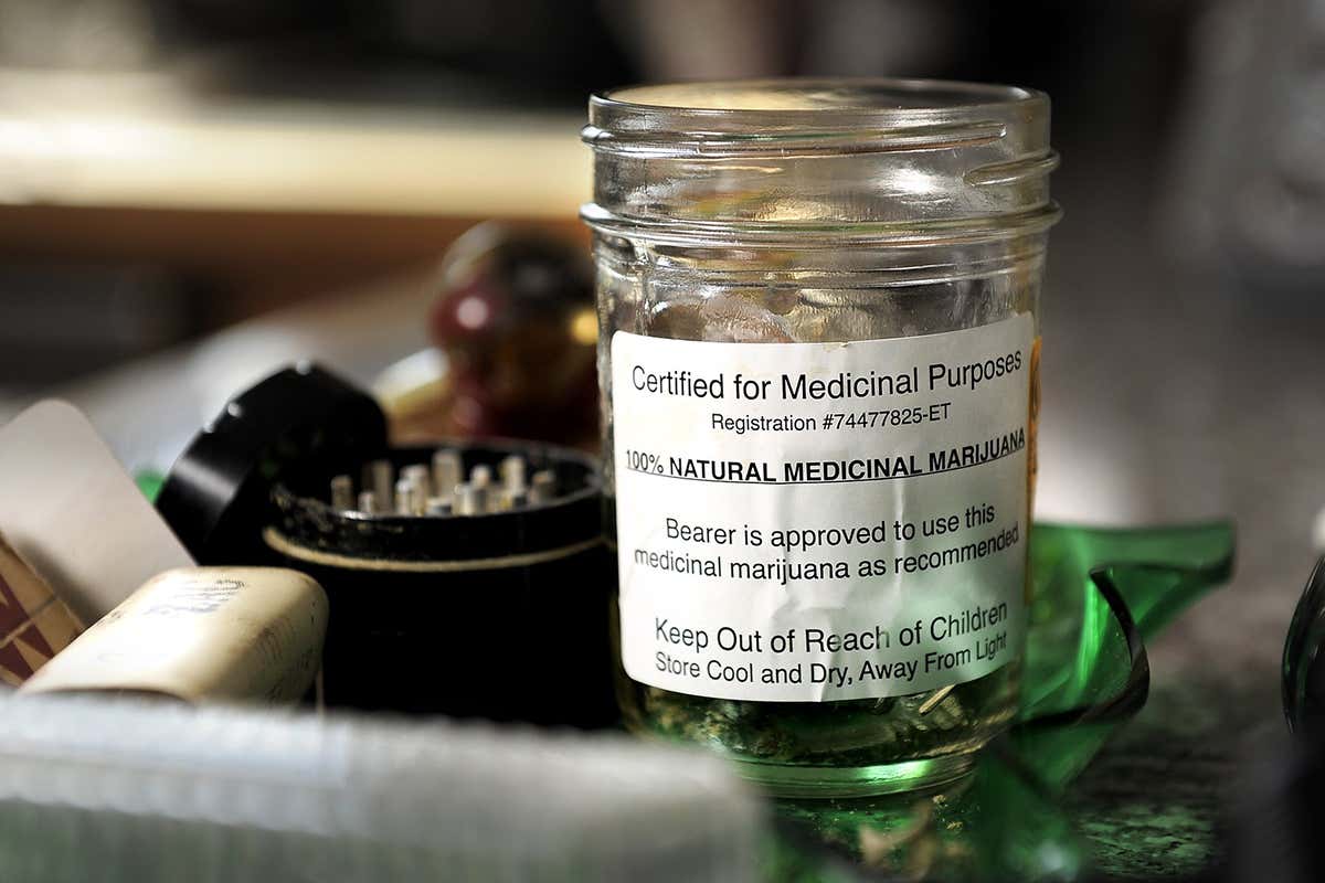 A pot of medical cannabis on a table