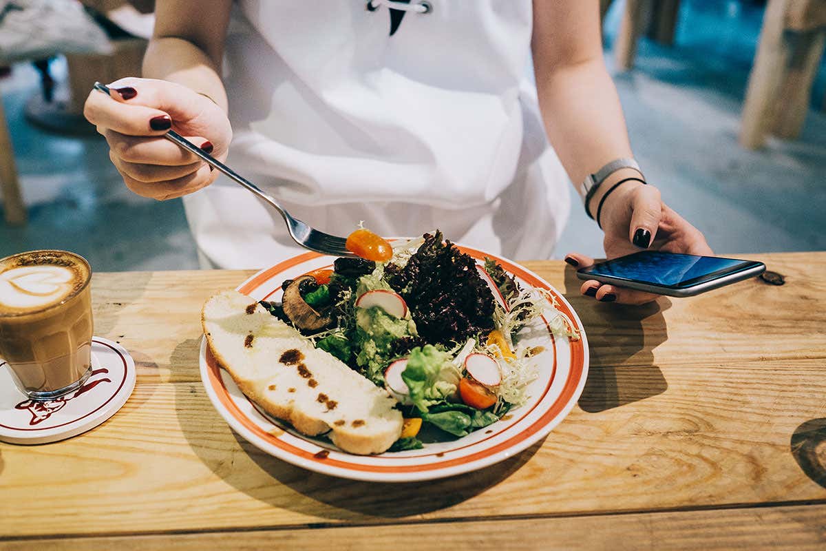 A woman eating salad