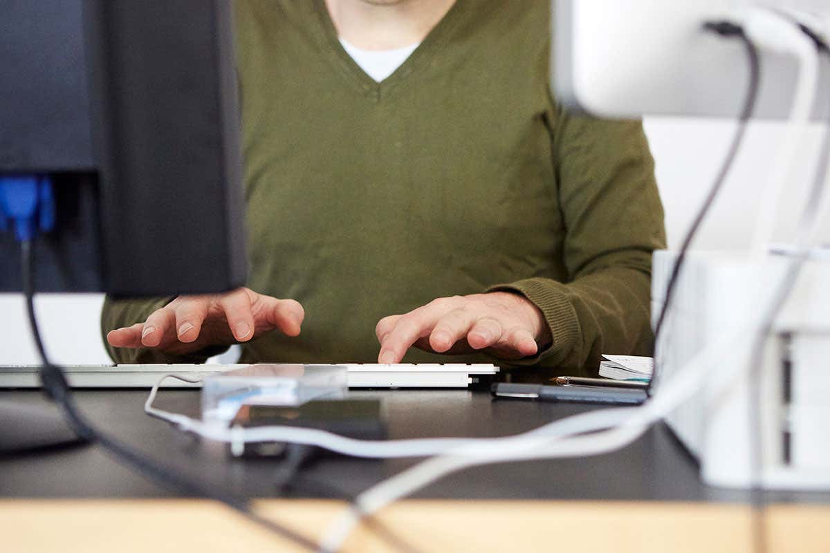 person typing mysterious things