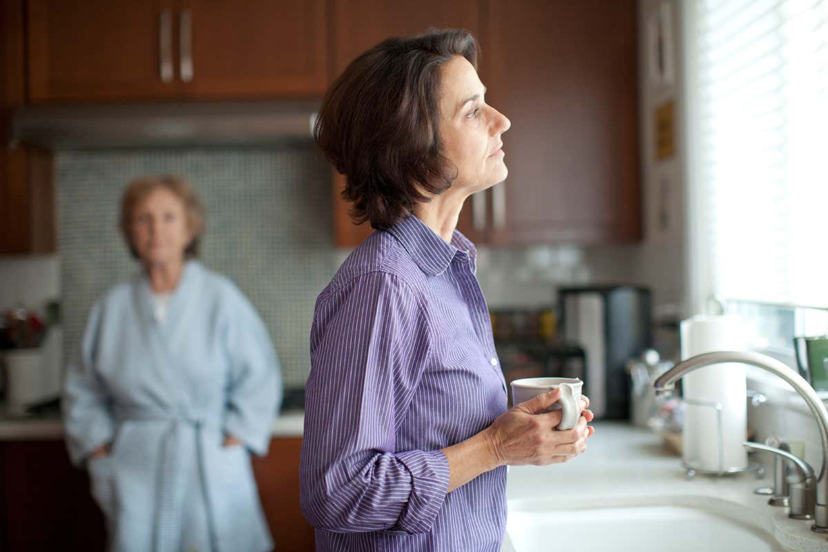 An older and younger woman in a kitchen