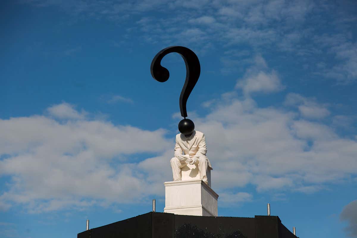 Question mark on statue