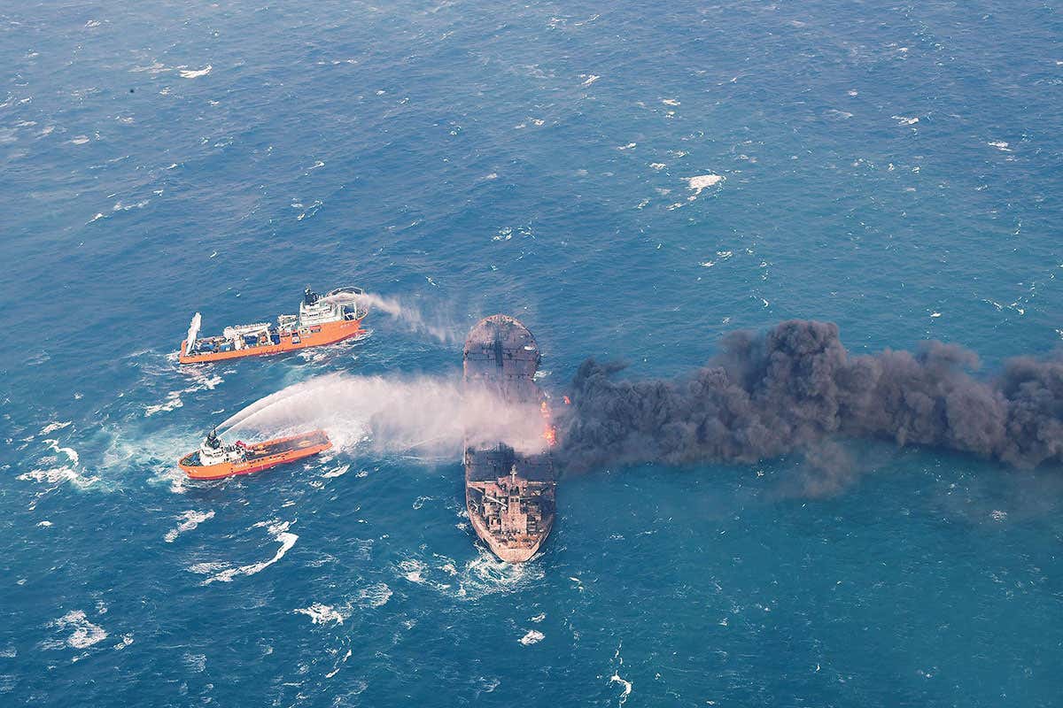 A capsized oil tanker is releasing invisible toxins into the sea