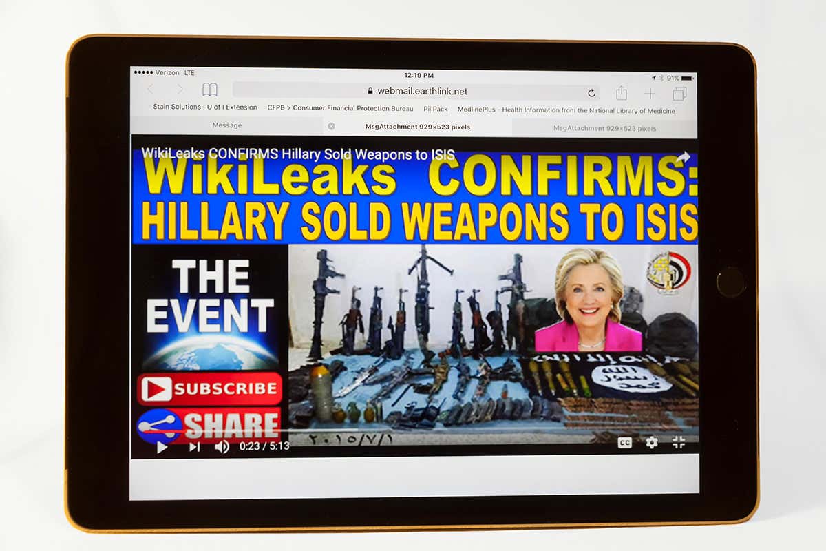 Computer screen showing video claiming that Hillary Clinton sold weapons to Isis