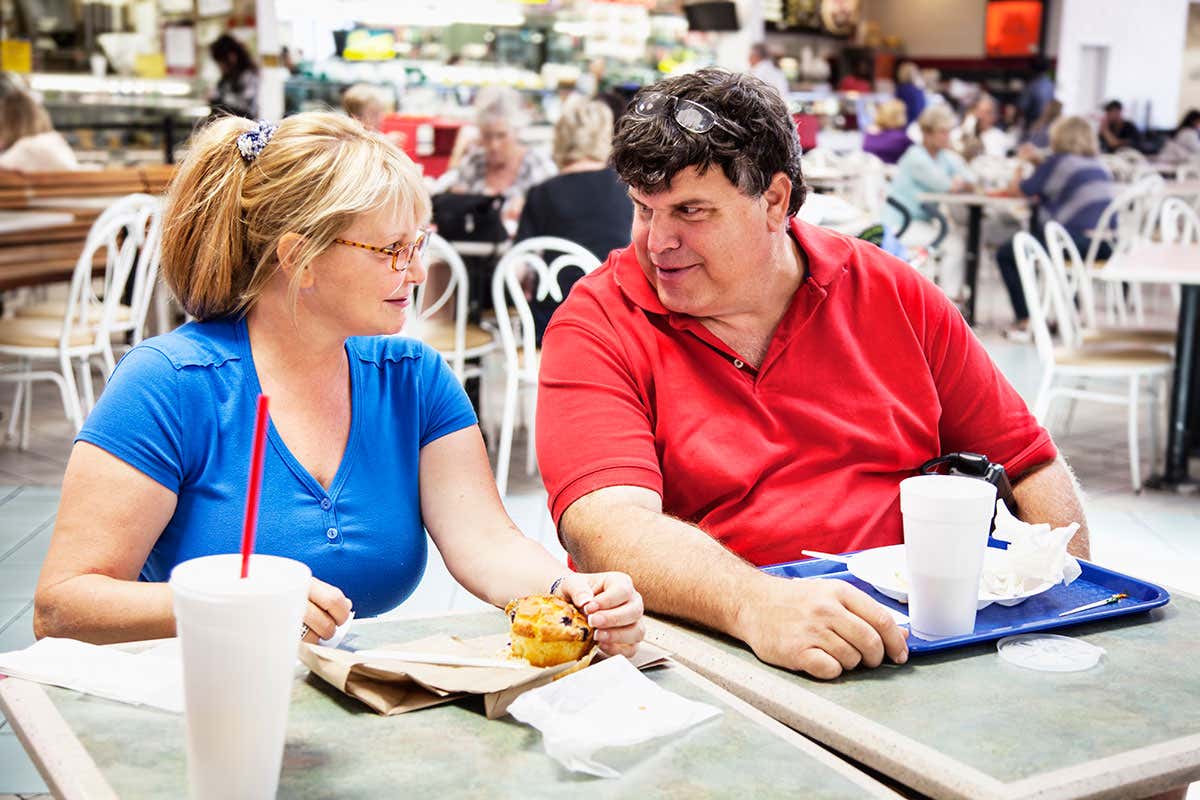 A couple eating food
