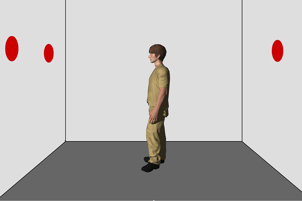 A person in a room with dots on the walls