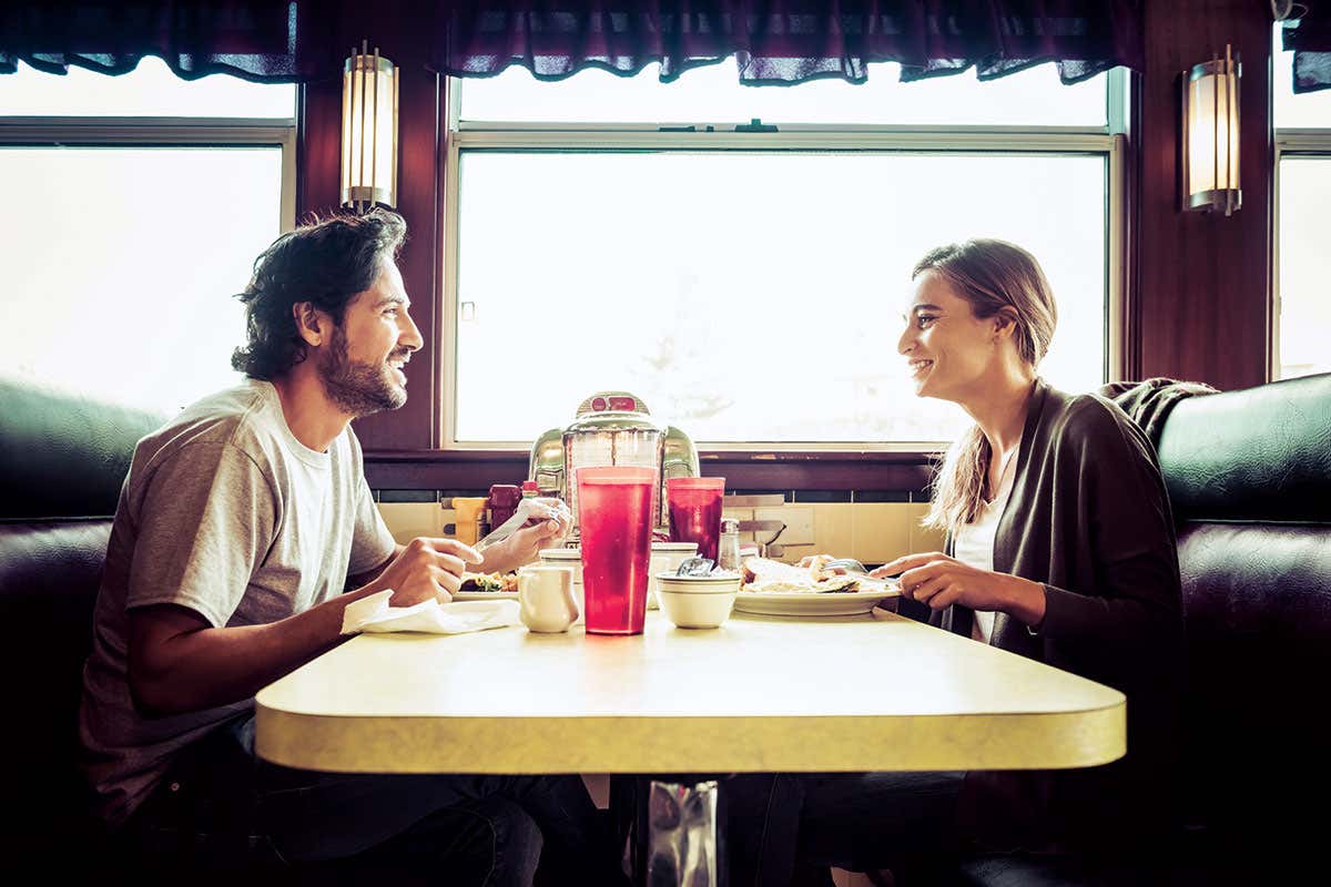 man & woman in diner