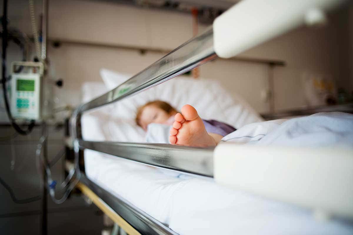 Child in hospital bed