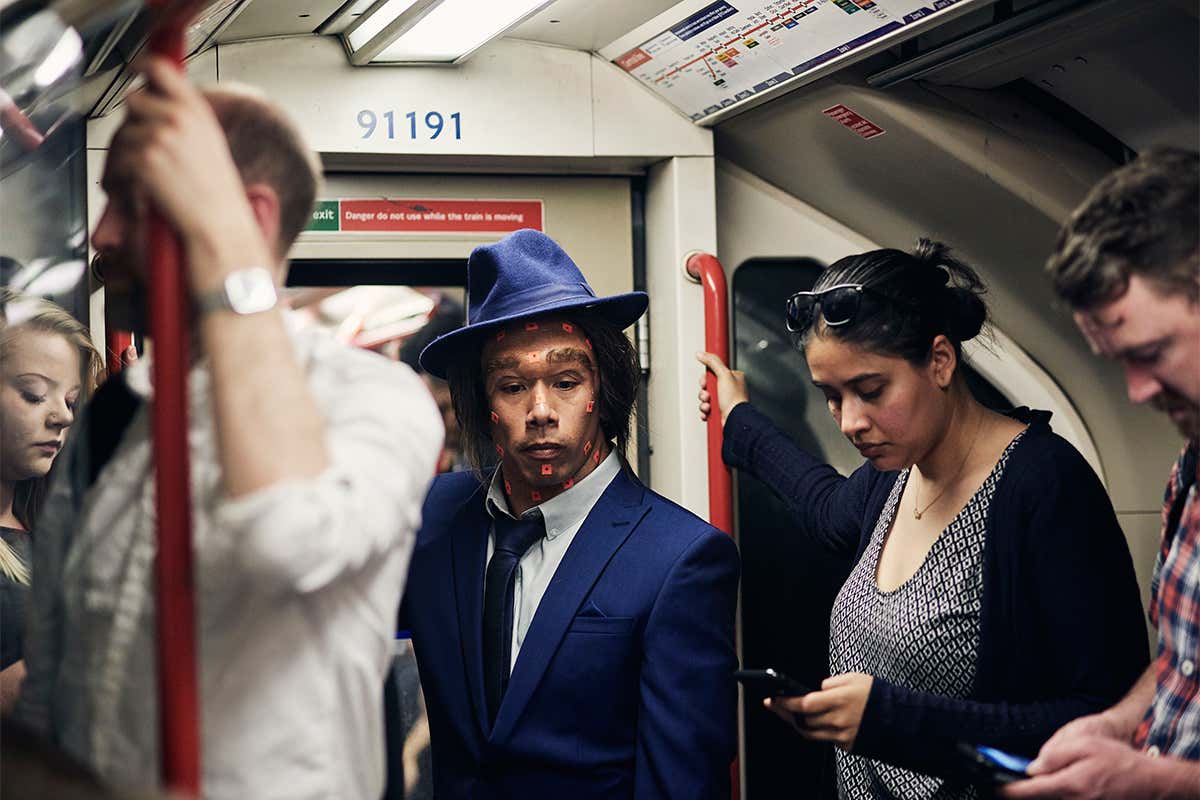 Andy Serkis in Neanderthal make-up