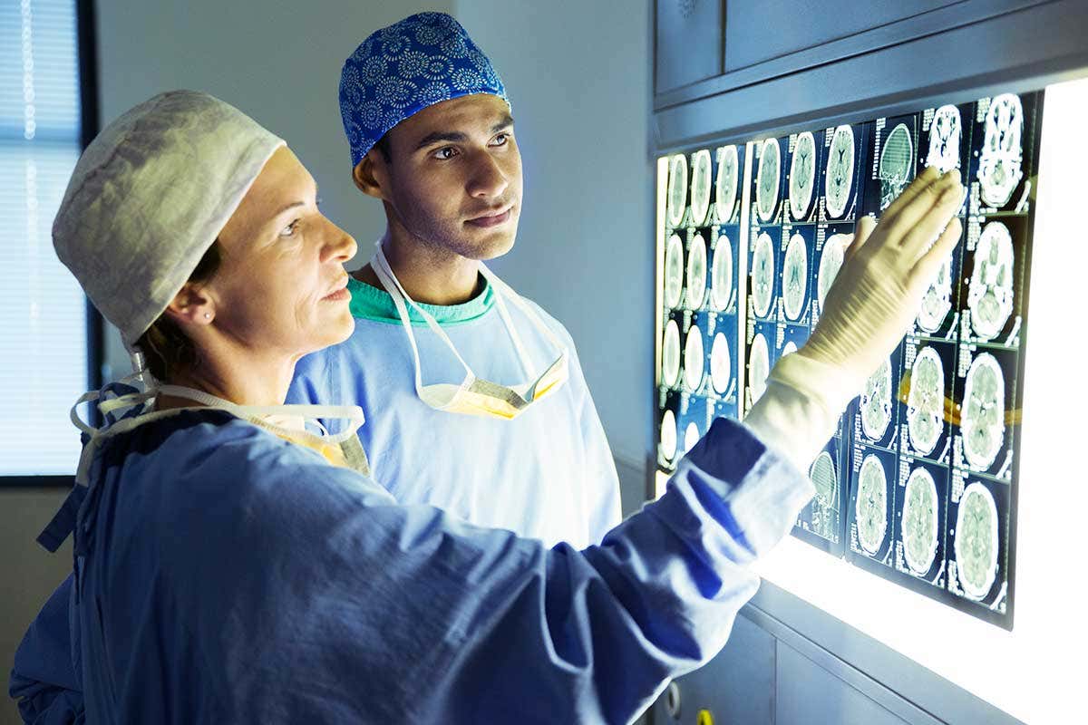 Doctors examine medical images