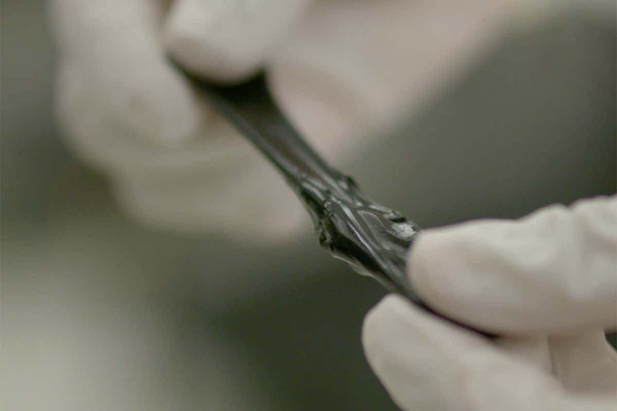 Black hydrogel being stretched