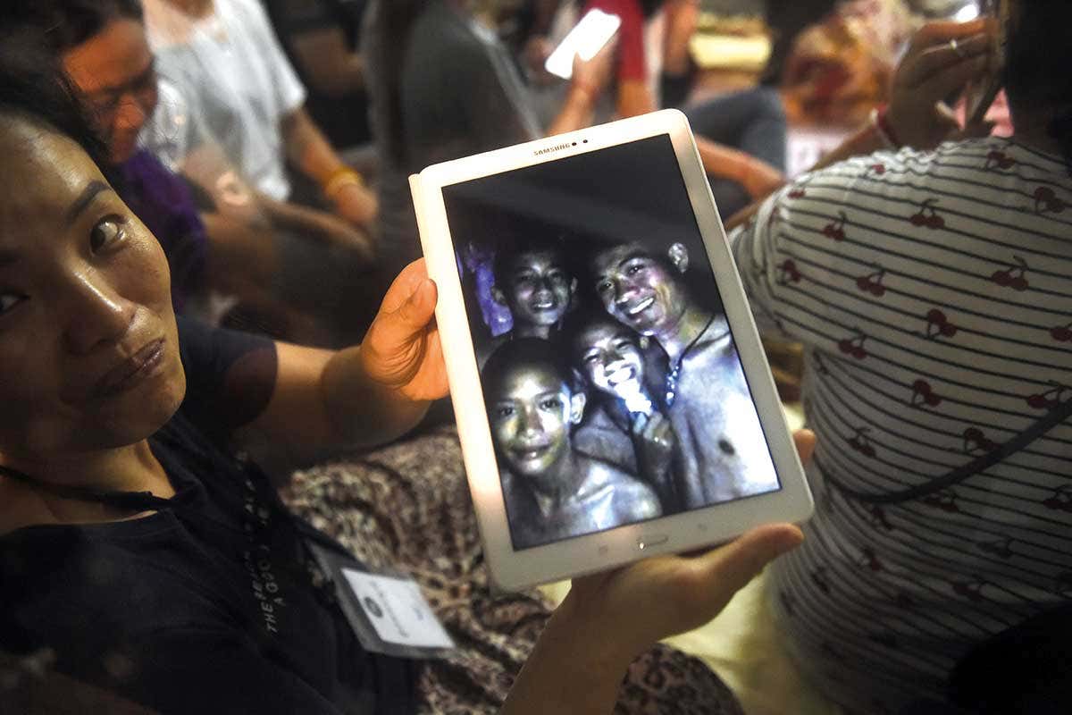 Thai boys in cave shown on tablet