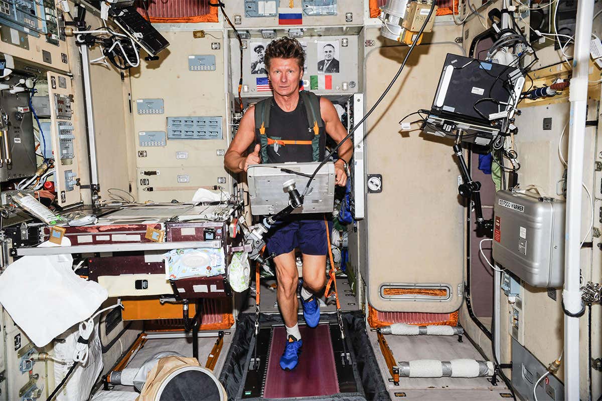Astronaut on a treadmill on the ISS