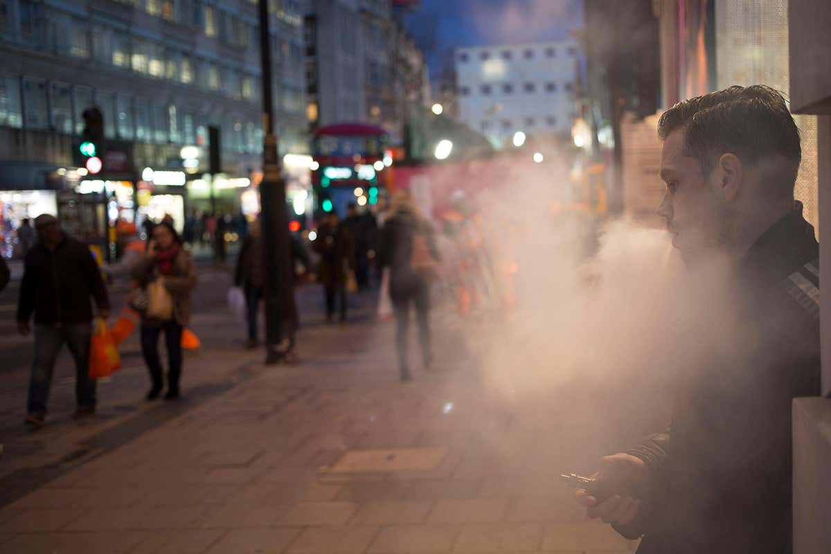 The vapour from vaping emerges onto a street