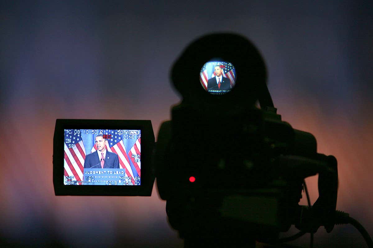 Barack Obama through the display on a video camera