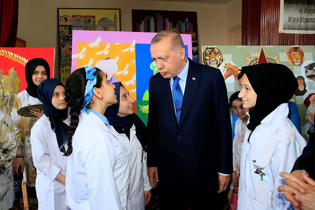 Turkish President Recep Tayyip Erdogan visits a school in Istanbul