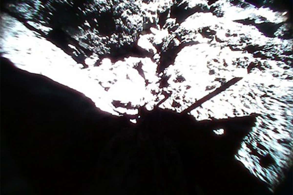 The shadow of the lander's pin and antenna