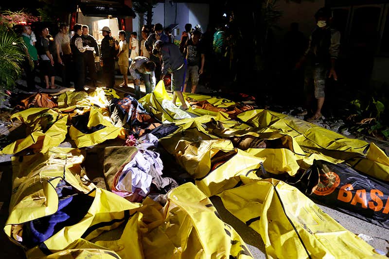 Body bags filled with people who have lost their lives from the tsunami