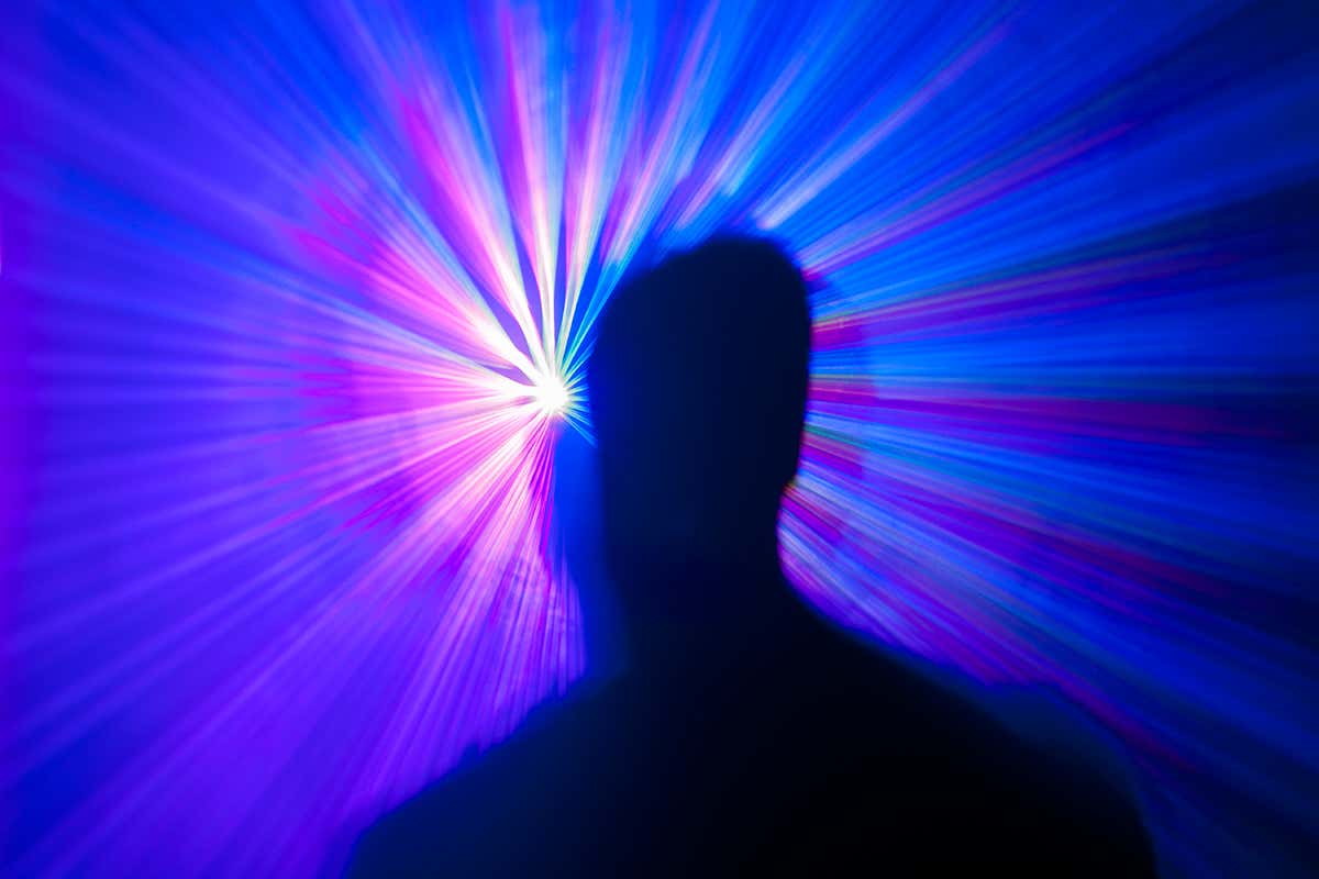 A person in front of a laser