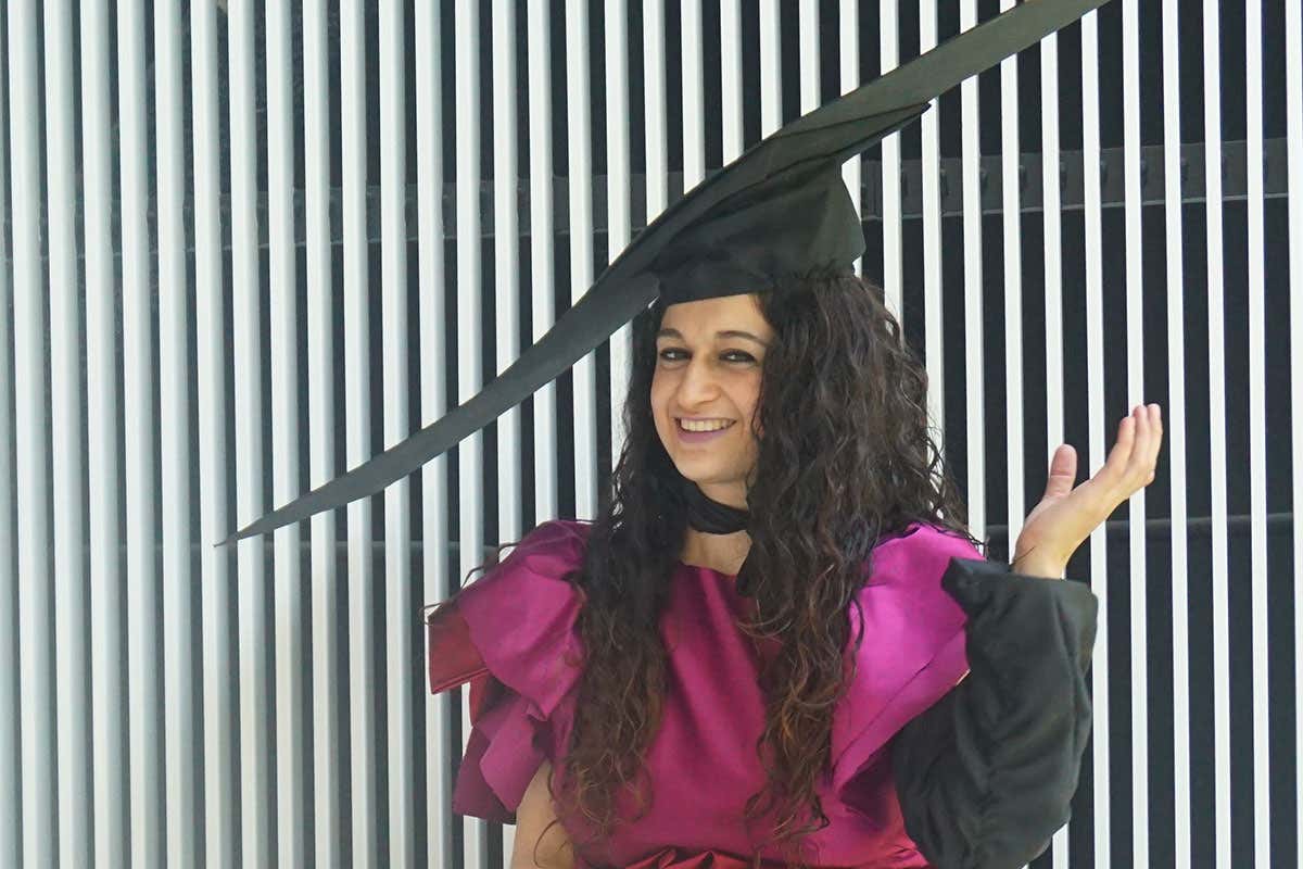 A person wearing a diving board hat