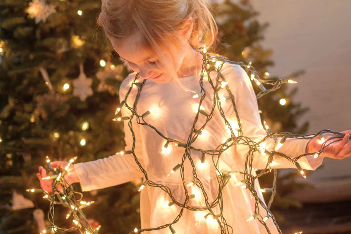 girl and fairy lights