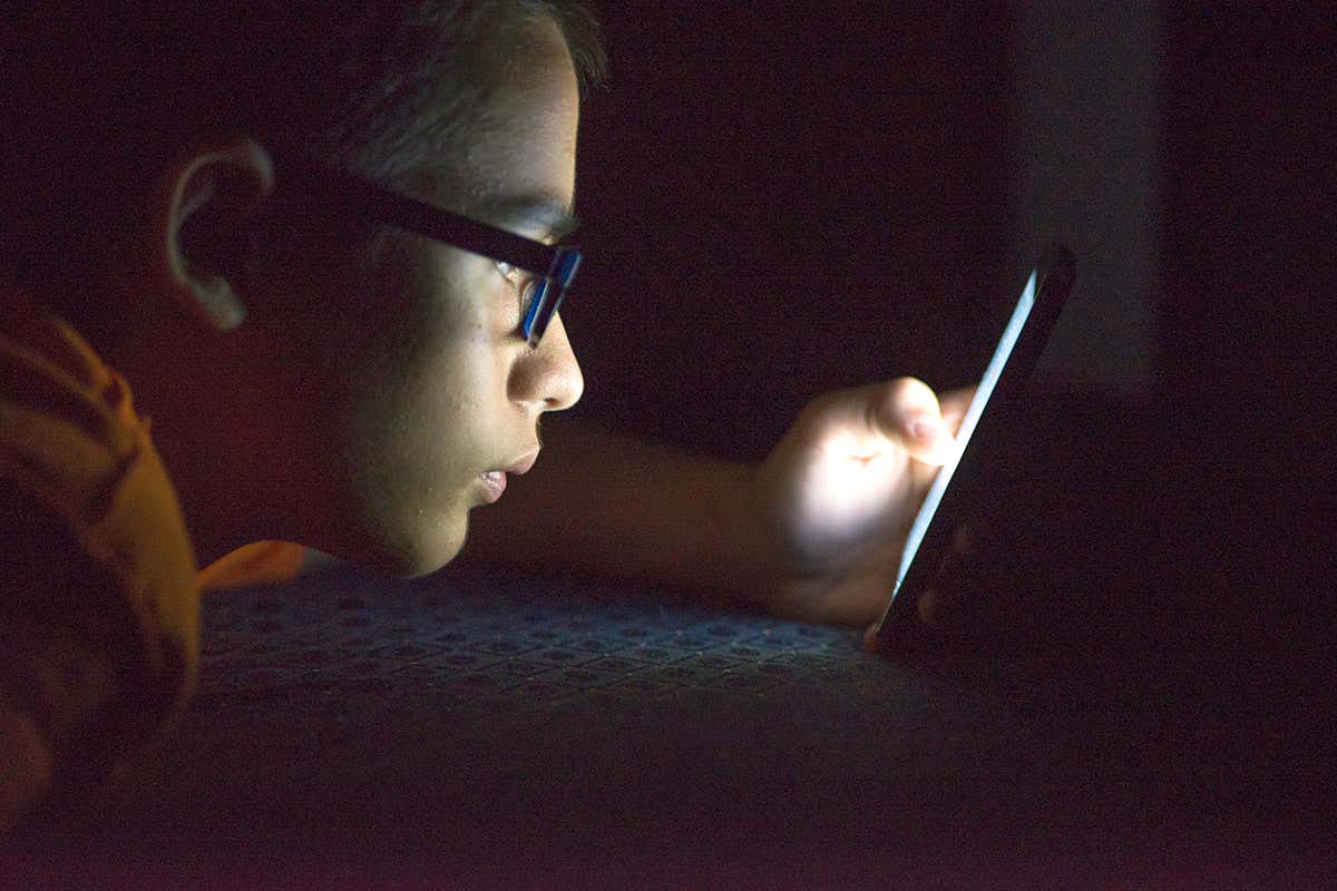 A child looking at a screen