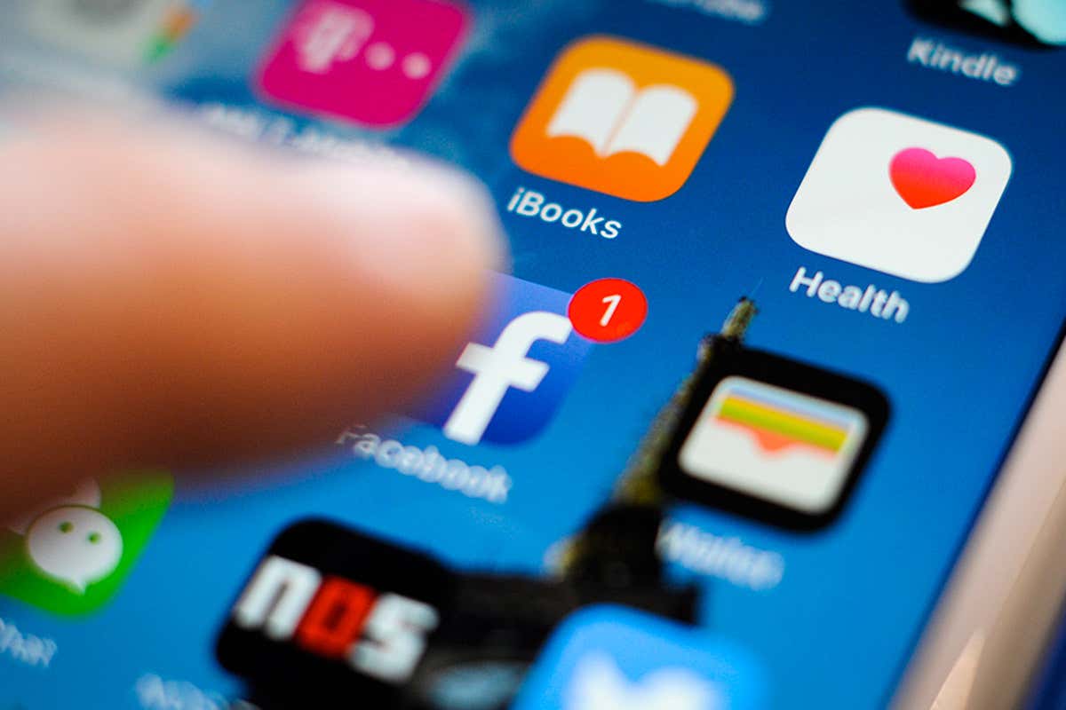 The Facebook logo on a phone