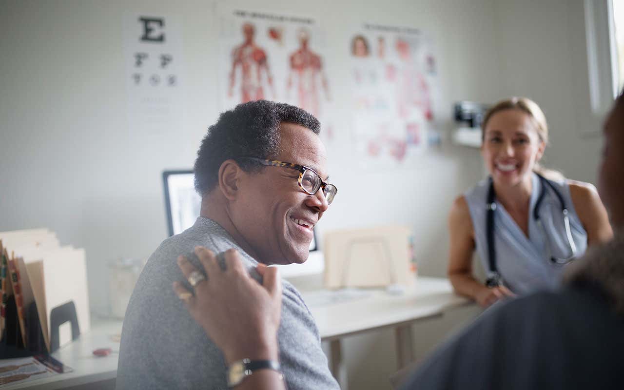 man looking happy in doctor's office