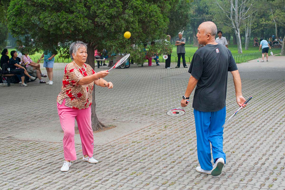 Two people playing a ball game