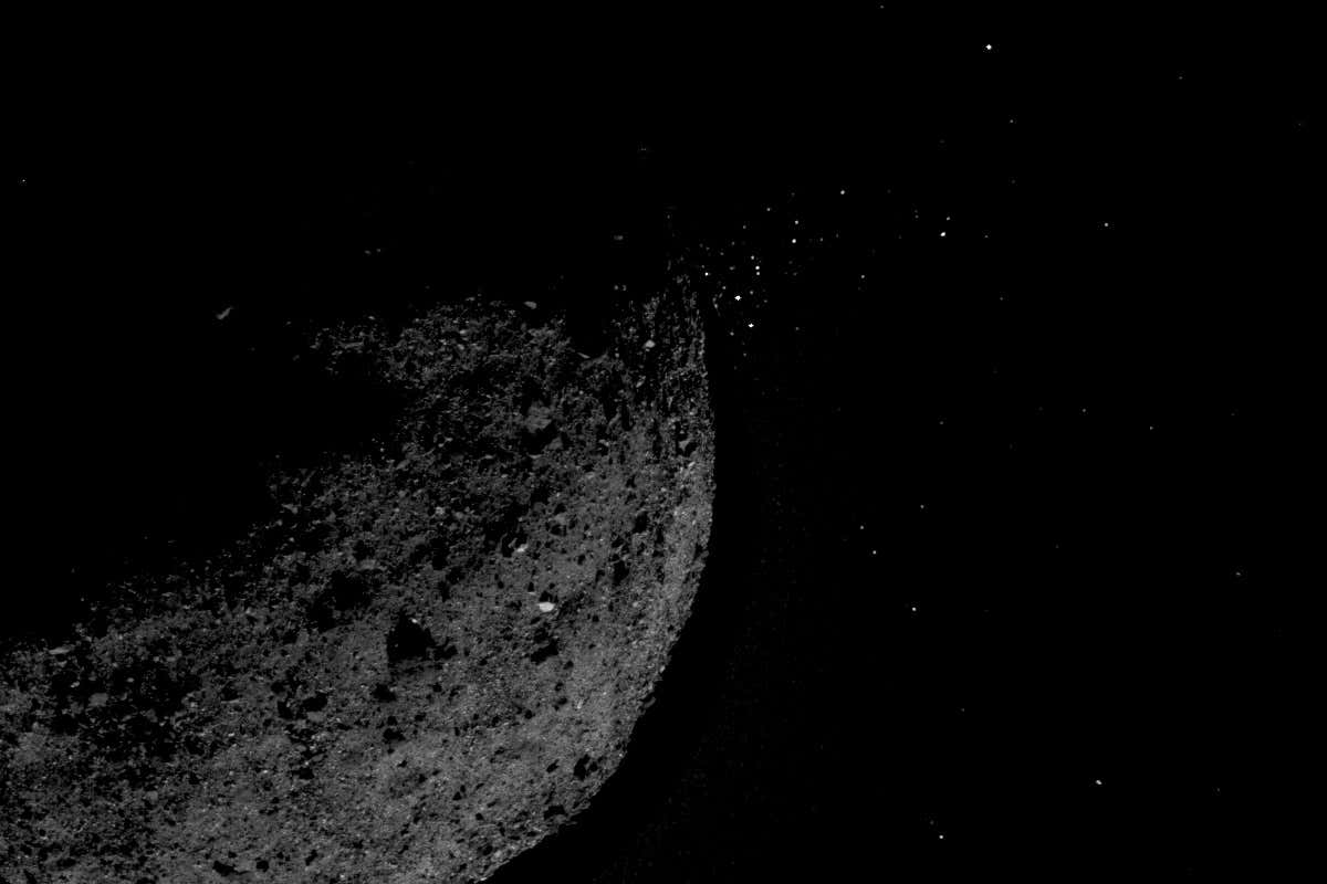 Asteroid Bennu with jets of particles