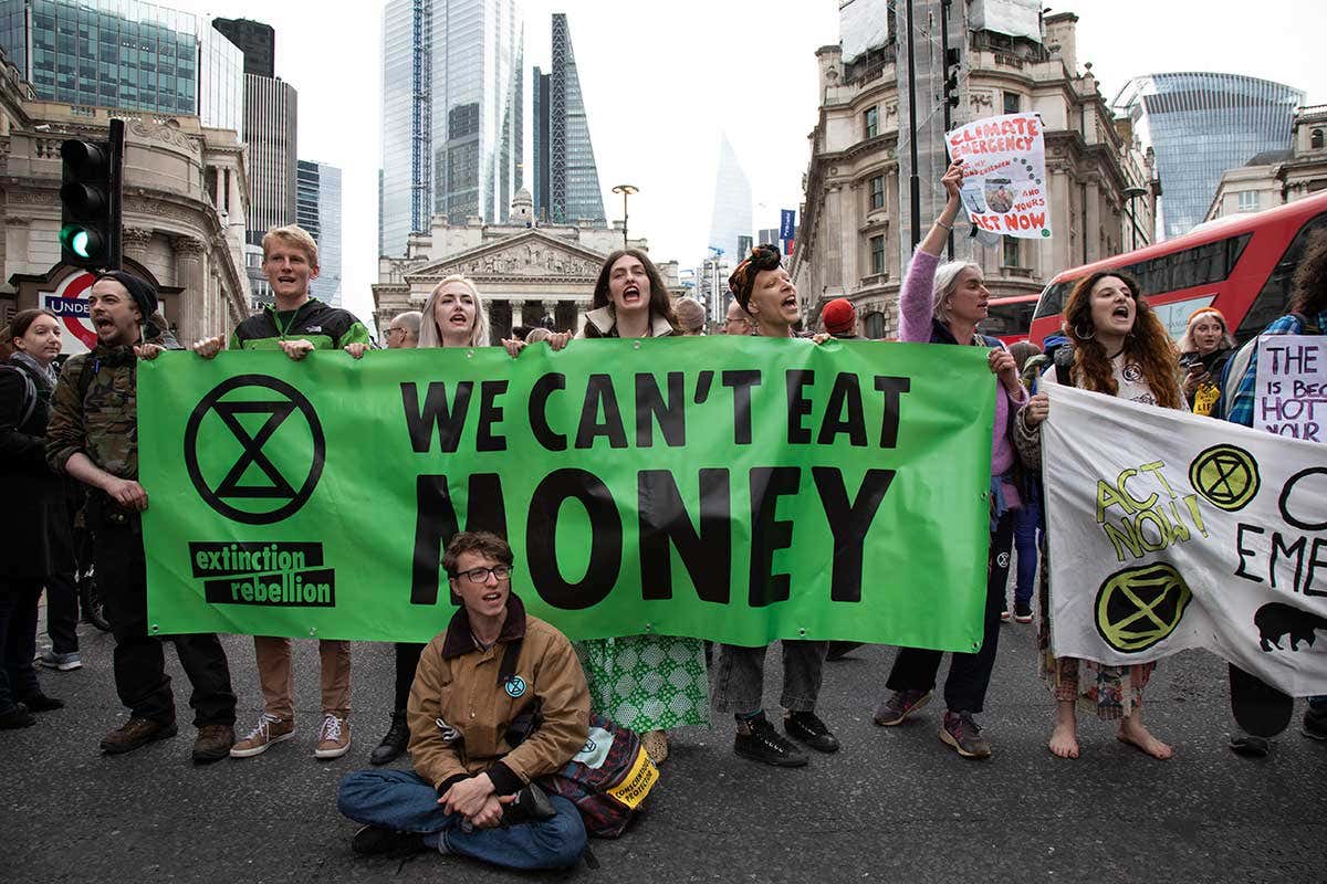 Extinction Rebellion activists blocked streets outside the Bank of England in London on 25 April