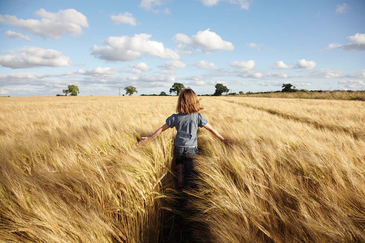girl in crop field