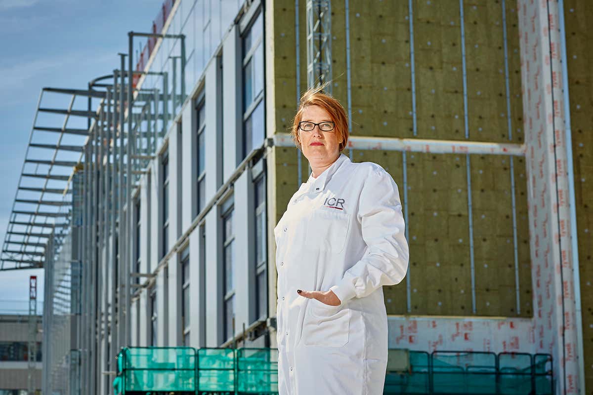 Olivia Rossanese outside the unfinshed Cancer Drug Discovery Centre