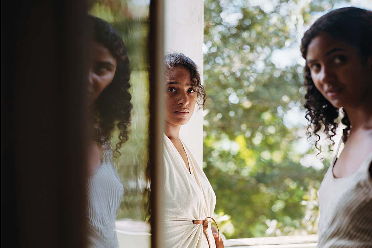 Two women standing in a doorway