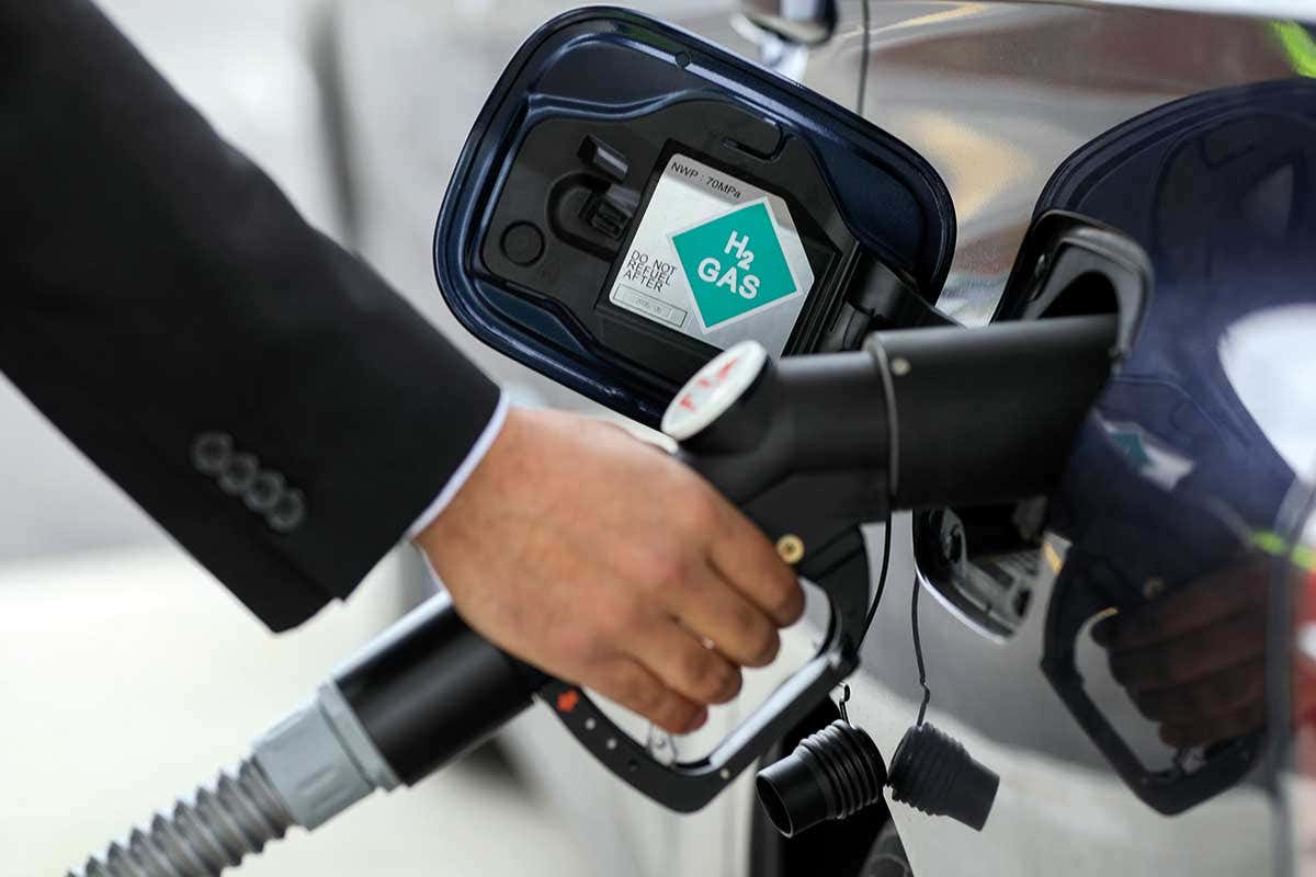 Car being fuelled from a pump