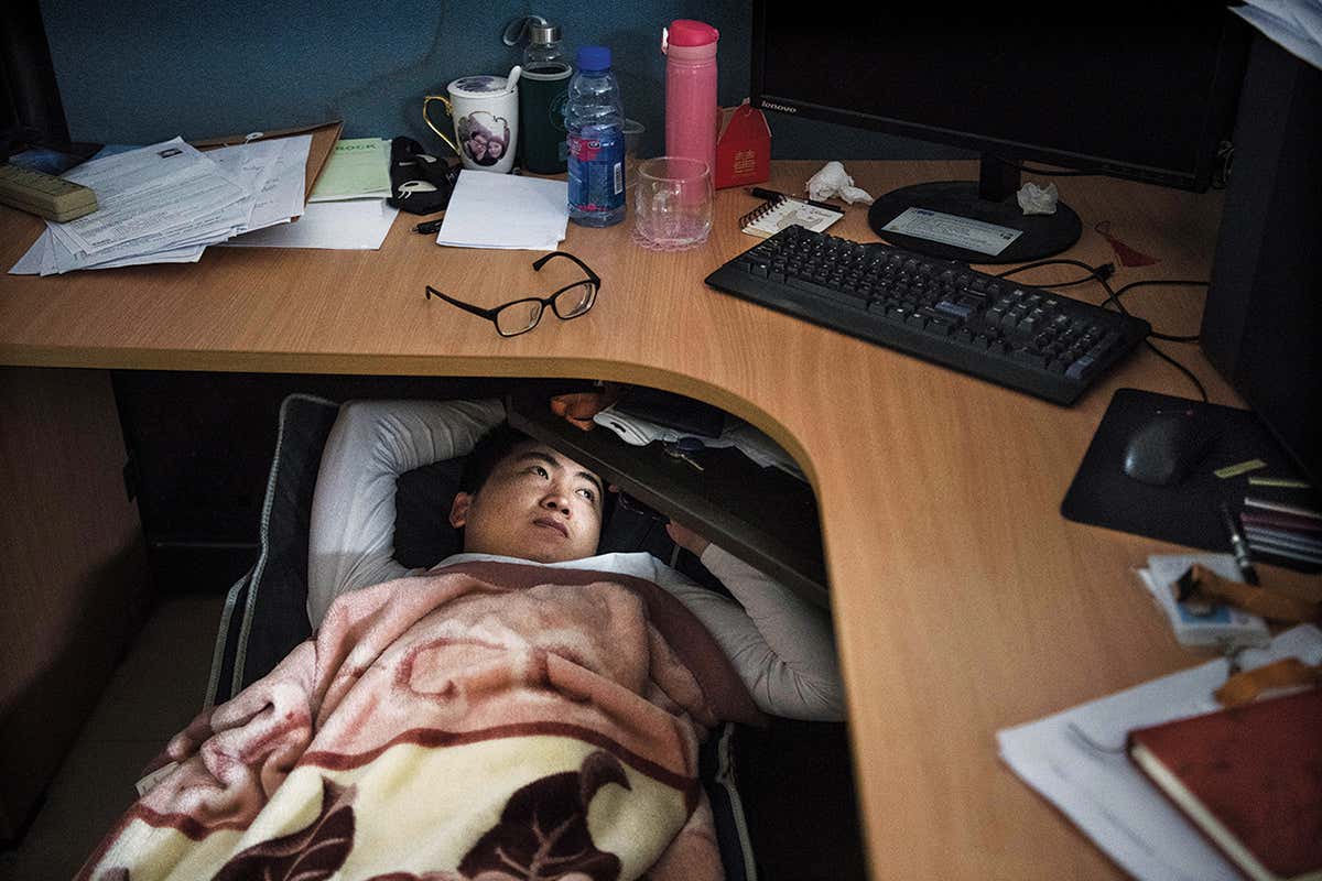 man under work space