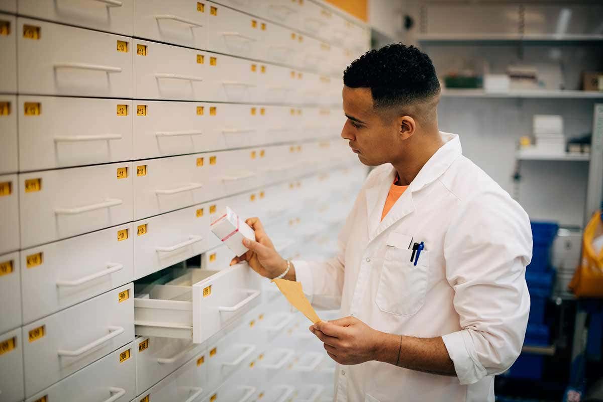 Pharmacist choosing medicines