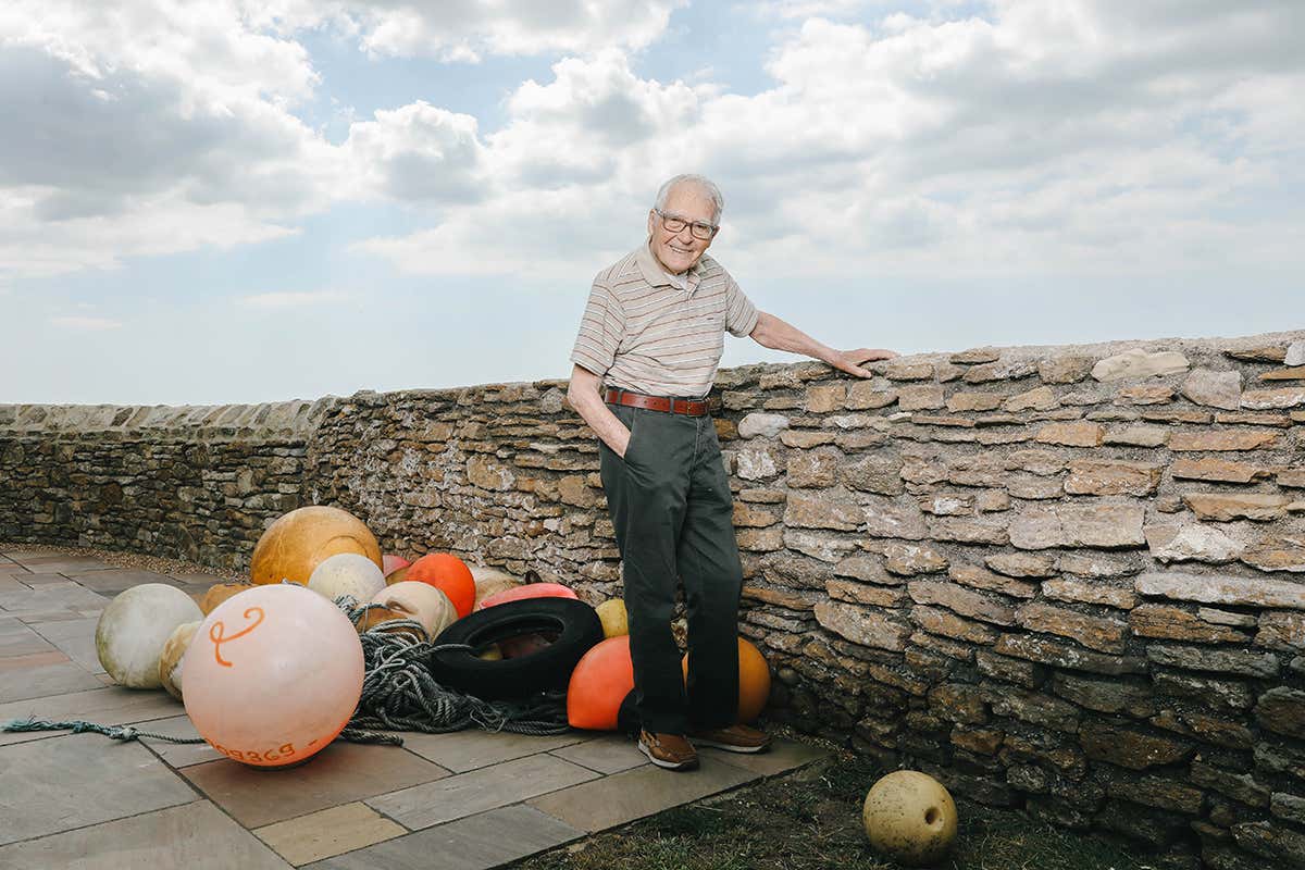 James Lovelock standing near the sea at Chesil Beach