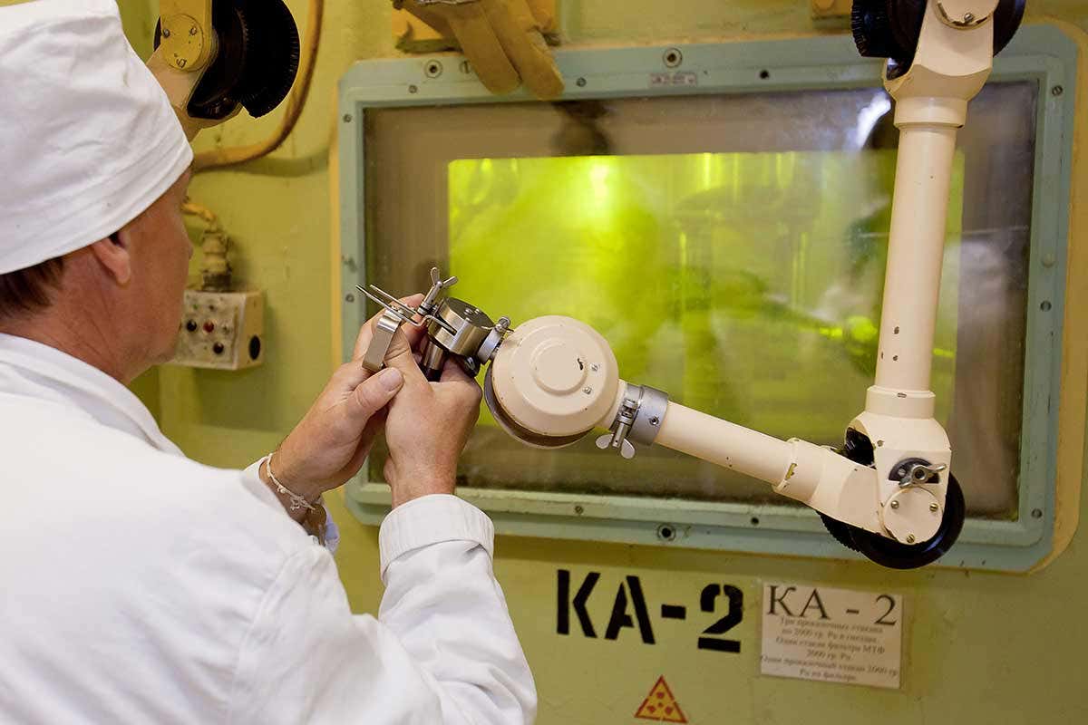 A person works in a nuclear facility