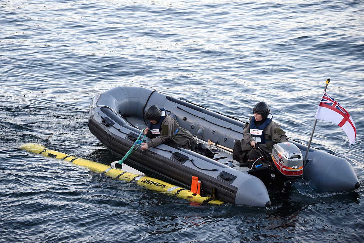 A boat and a robot sub