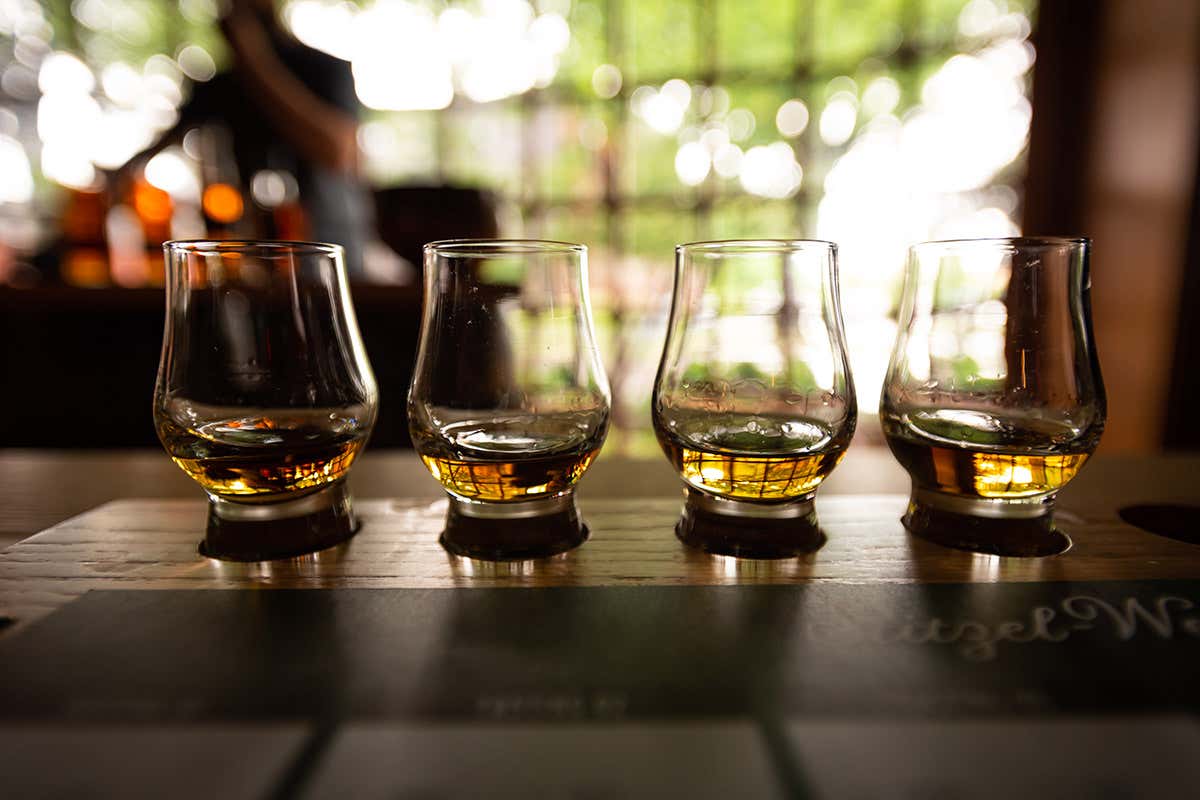 Four drams of whisky