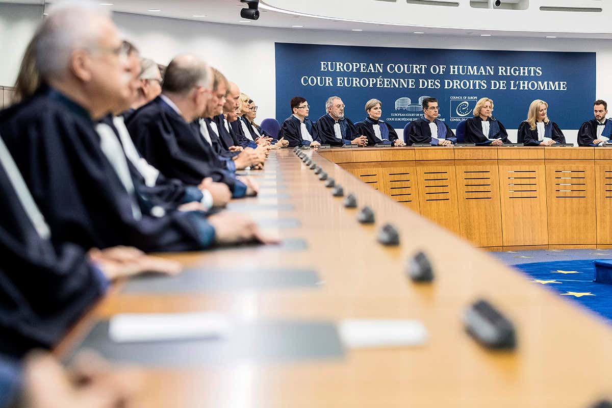 Judges of the European Court of Human Rights listen in Strasbourg, eastern France, on October 31, 2017. French President Emmanuel Macron addresses the European Court of Human Rights, where he is expected to defend France's controversial anti-terror law that gives authorities permanent powers to search homes, shut places of worship and restrict the movements of suspected extremists. / AFP PHOTO / POOL / Jean-Francois Badias (Photo credit should read JEAN-FRANCOIS BADIAS/AFP/Getty Images)