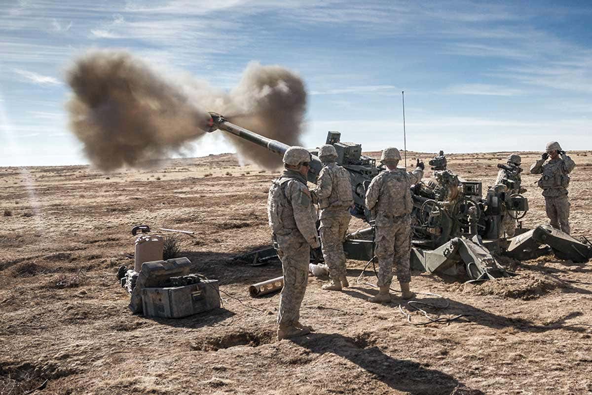 Soldiers assigned to 2nd Infantry Division Artillery, 7th Infantry Division (ID) fire an M777 155 mm howitzer at Orchard Combat Training Center, Idaho