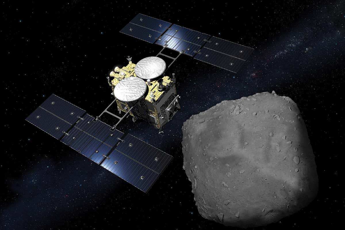 Japan's Hyabusa-2 spacecraft orbiting the asteroid Ryugu