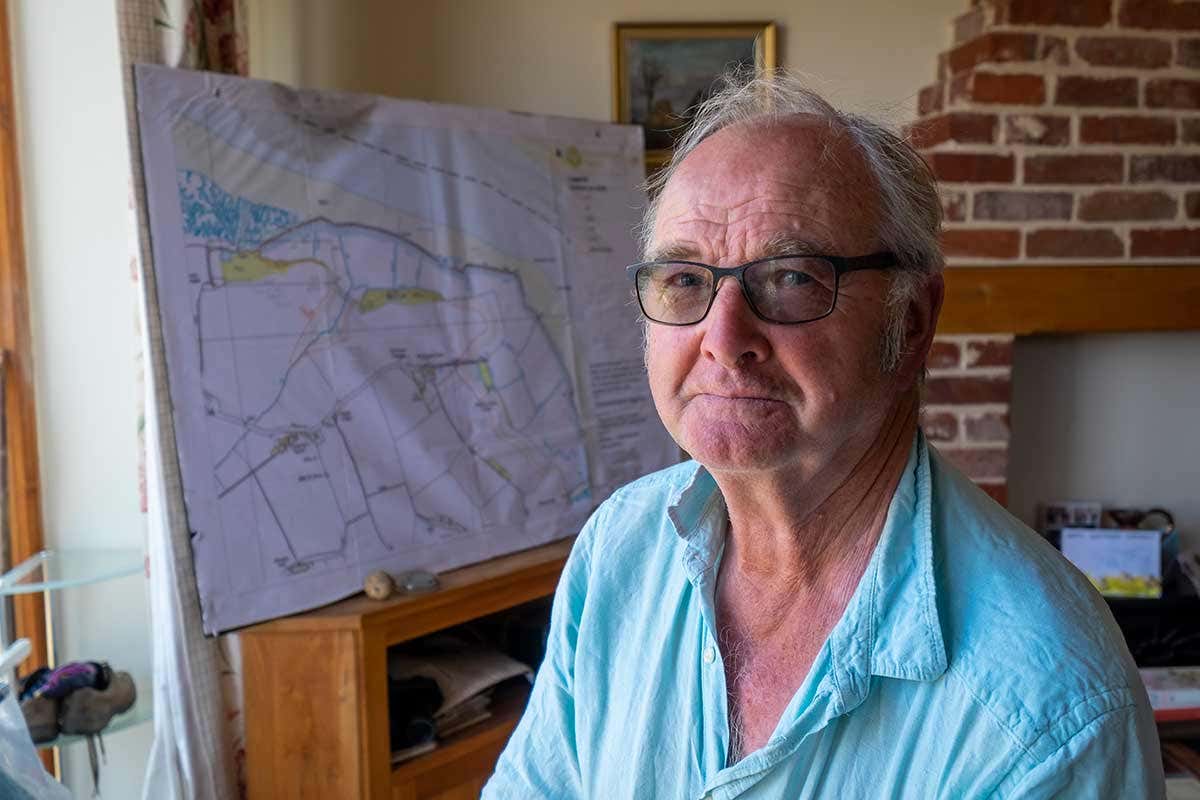 Farmer, Richard Wrinch, on the bank of the River Orwell at Shotley. His farm contains an ancient river wall which has been breached during very high tides and is likely to be part of a future flood plan.