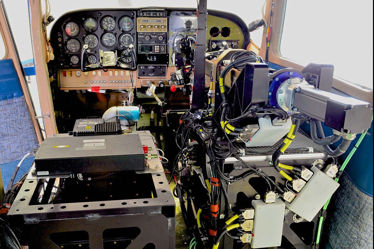 Rear view of the installed ROBOpilot system during preflight for first flight.