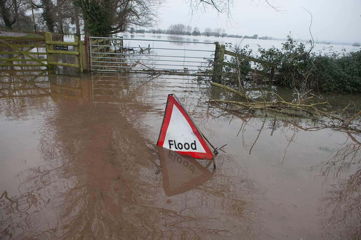 A flood sign in a flood