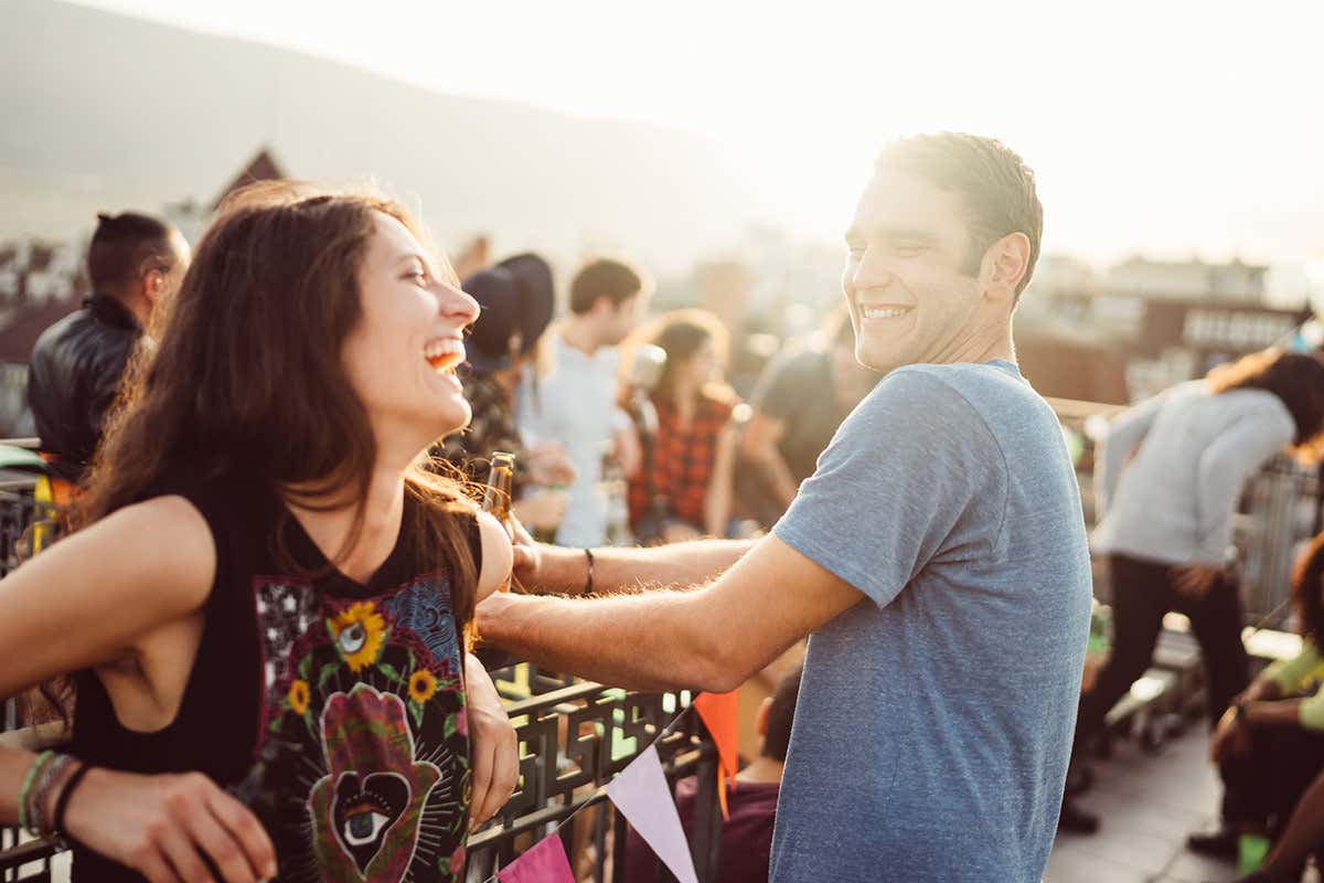 man and woman smiling