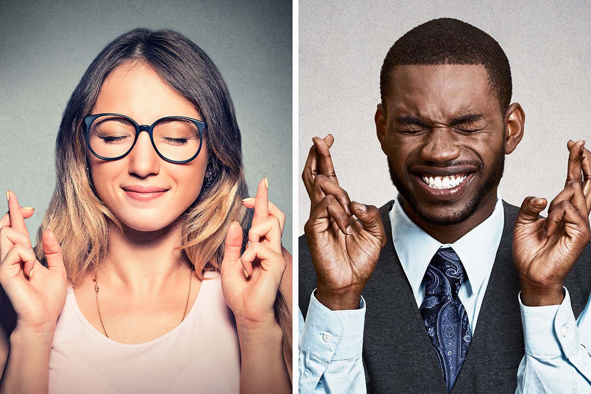 Two people hopefully crossing their fingers