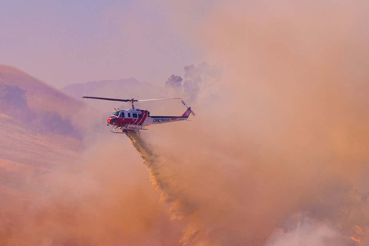 Helicopter putting out a fire