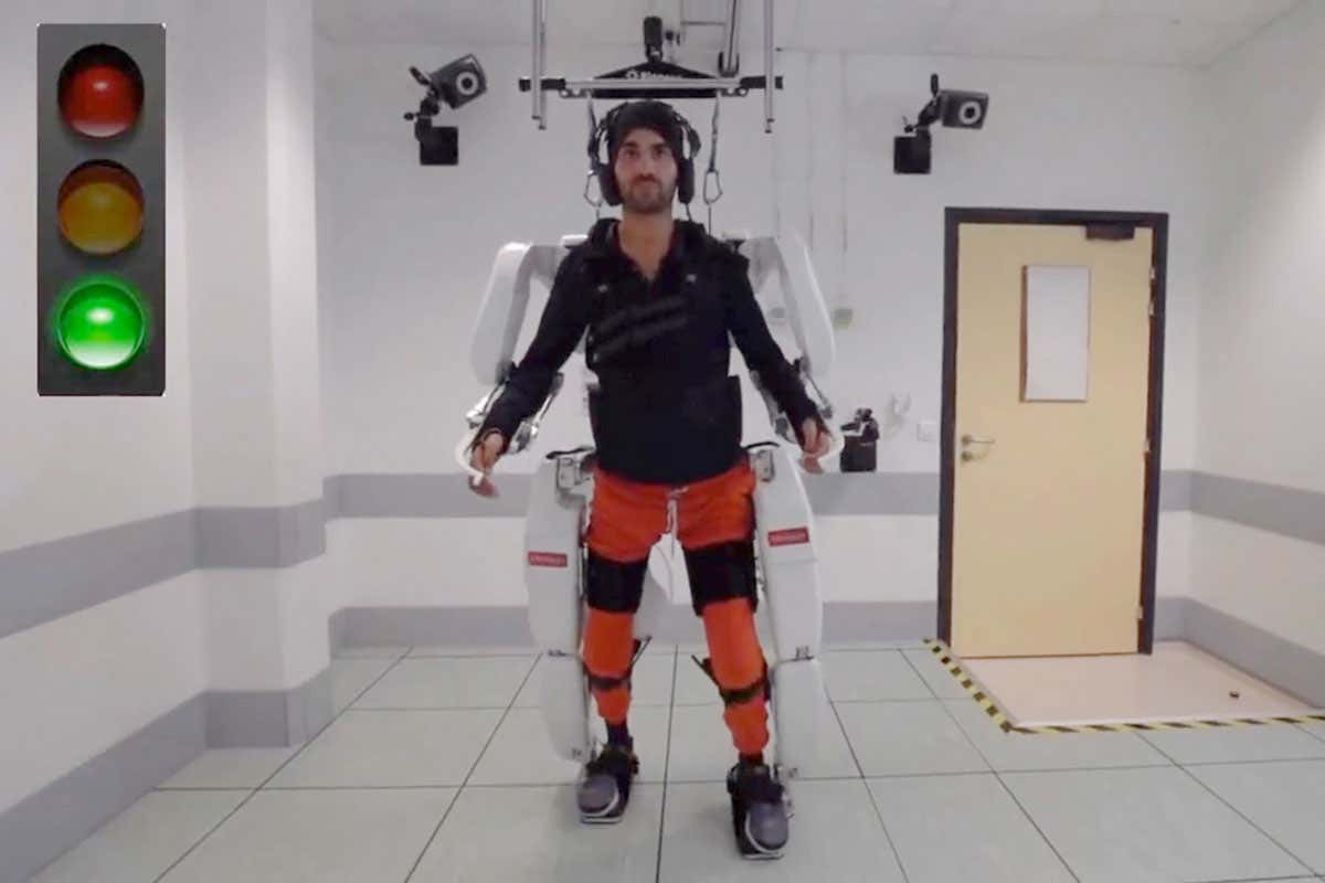 Thibault walks using an exoskeleton